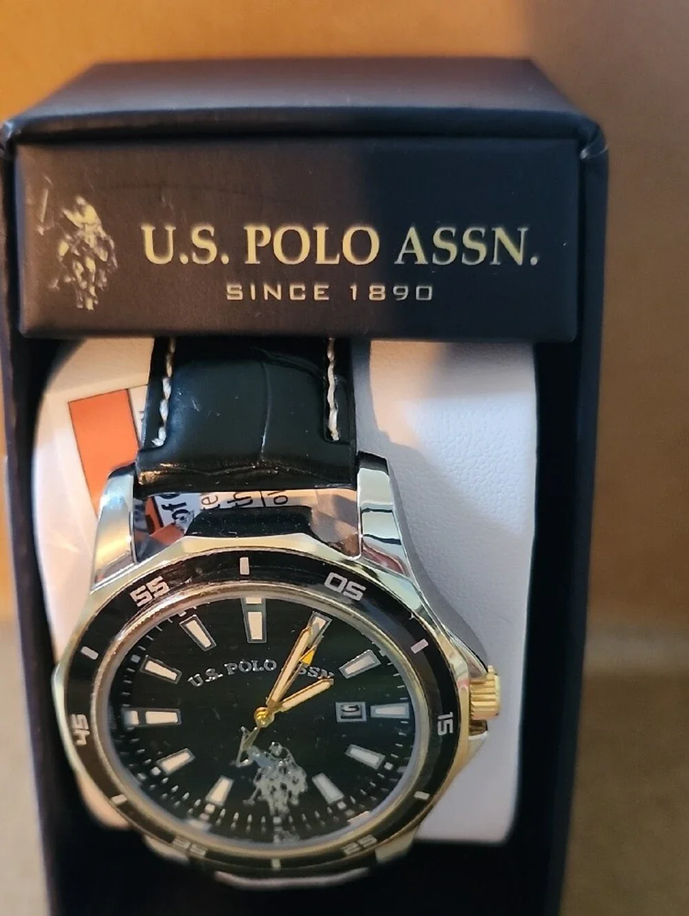 U.S. Polo Assn. Black Dial Watch with Black Leather Strap and Gold Accents